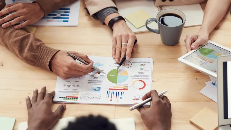 ClickAlpha team working on digital marketing strategy